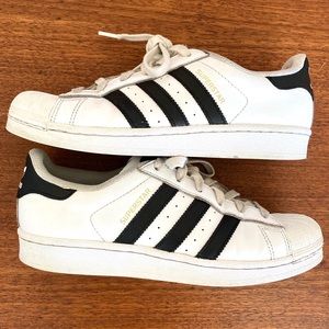 white shoes with black stripes
